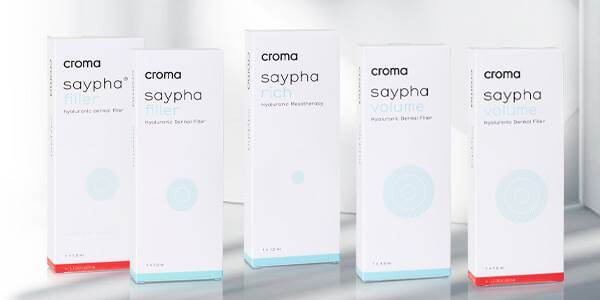 Saypha products and model with dermal filler in lips